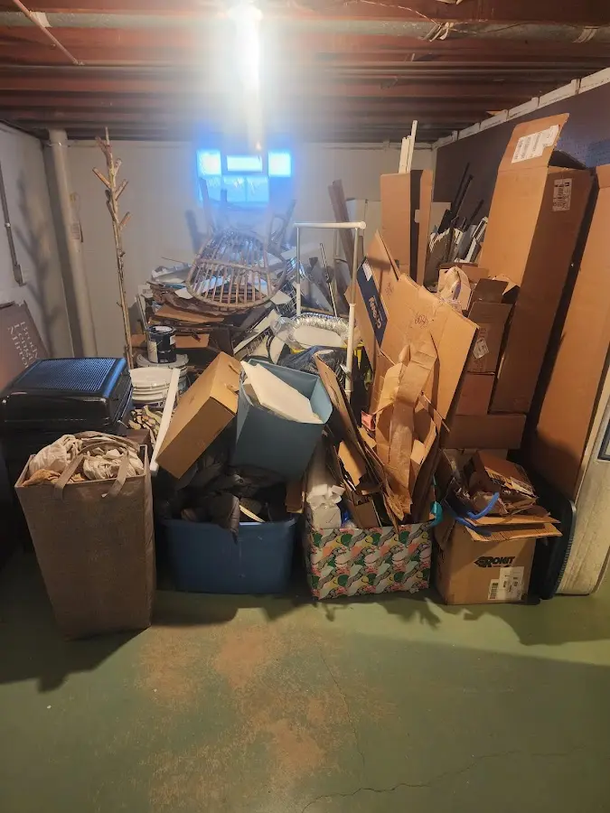 Roll-off dumpster container at job site for Yard Waste Dumpster Rental in Tellico Village